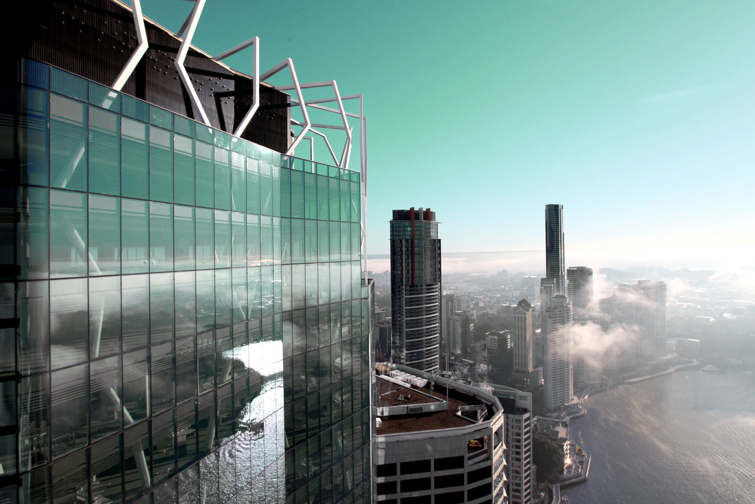 Riparian Plaza rising over the Brisbane CBD skyline, home of North South Real Estate's advisory offices