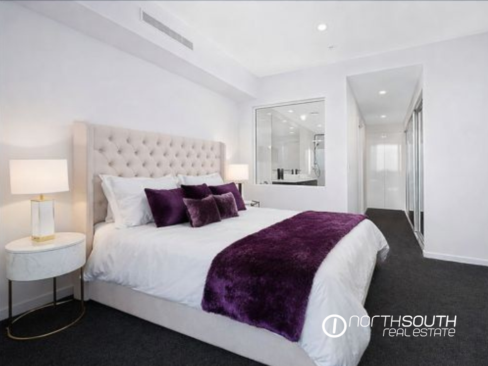 Master bedroom with ensuite in WaterPoint Residences showcasing contemporary coastal properties for sale