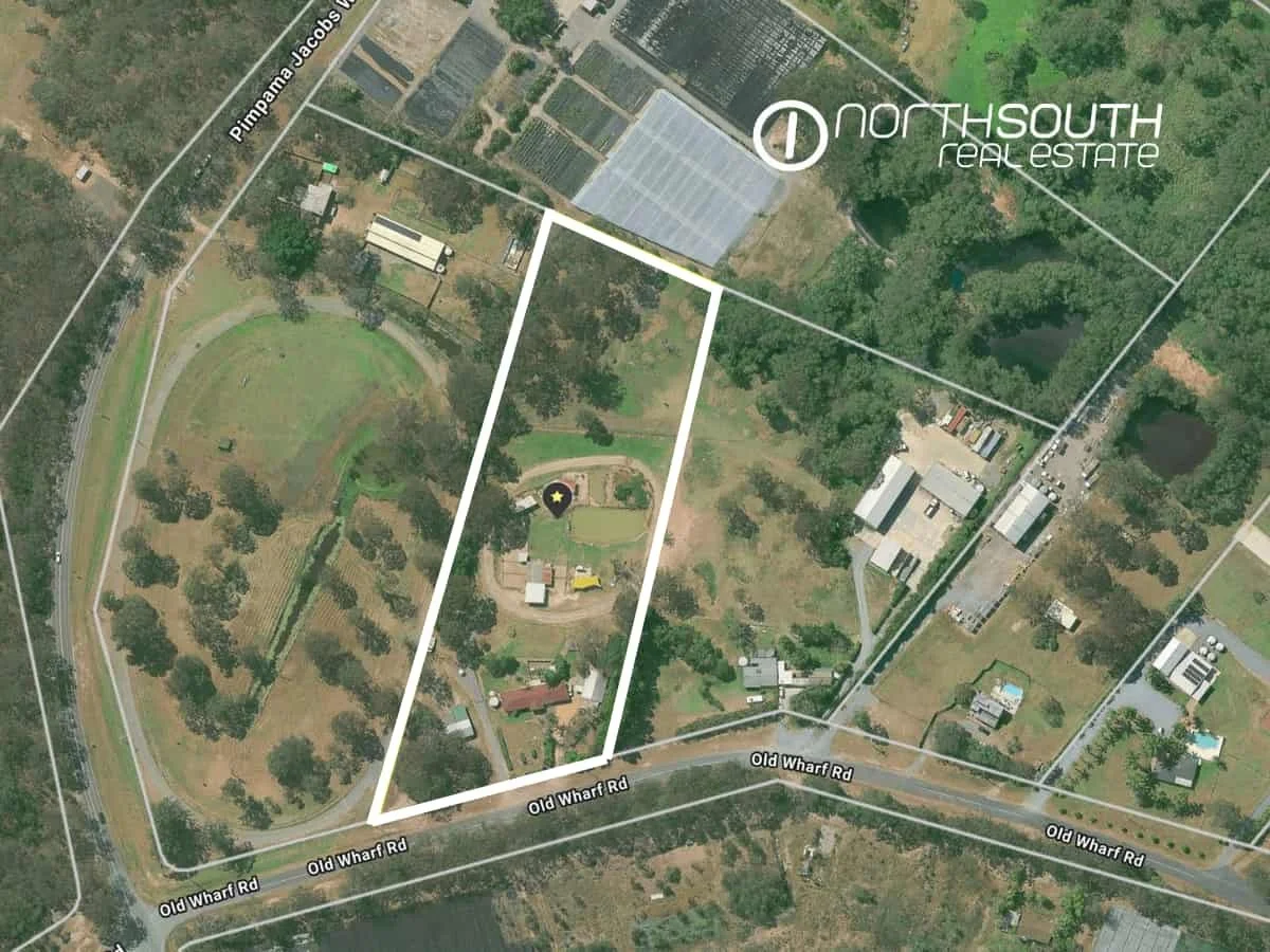 Top-down aerial image of an 5 acre property in Pimpama with boundaries marked, showing a potential development site