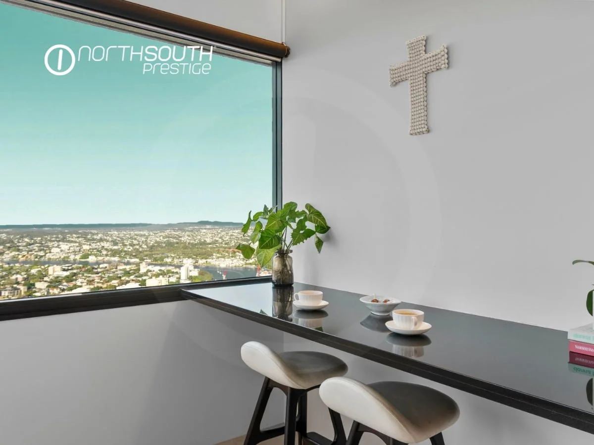 Breakfast nook with freshly made coffee with Brisbane city views from the windows - apartment 4903 for sale at Riparian Plaza  
