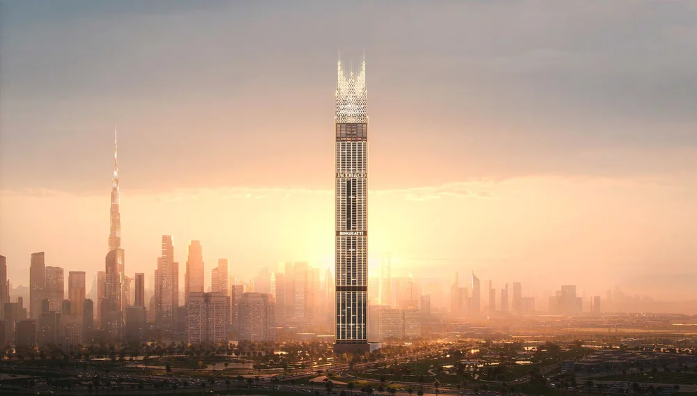 The Burj Khalifa, an iconic skyscraper in Dubai, stands tall amidst a city skyline at sunset with a cloudy sky.