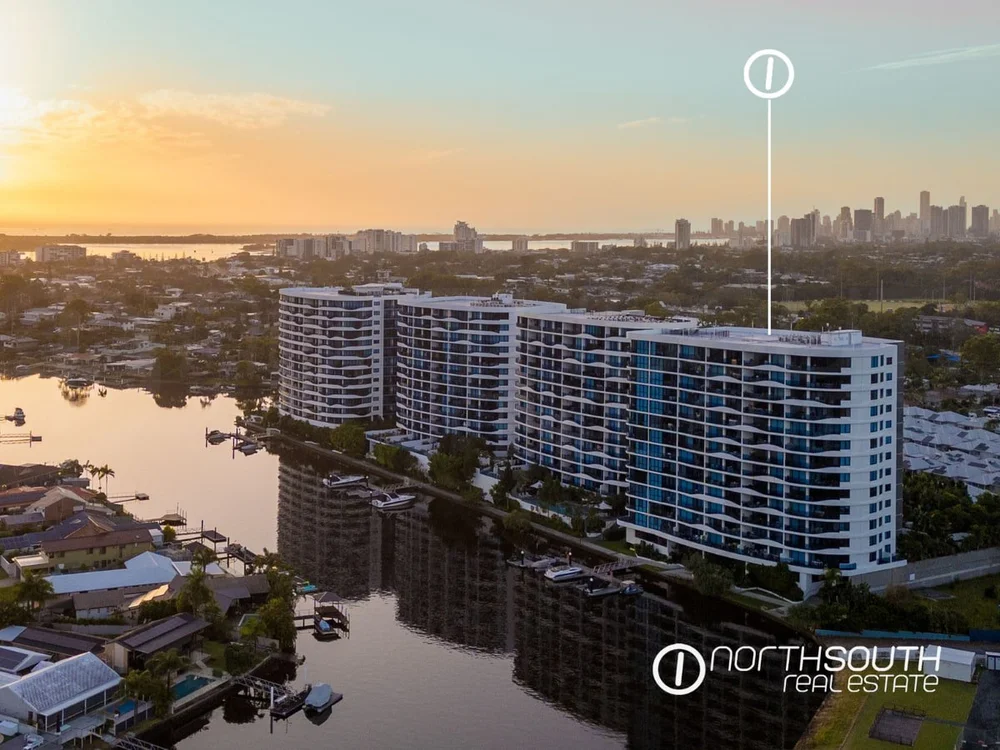 Exterior twilight view of WaterPoint Residences in Biggera Waters. luxury waterfront properties for sale