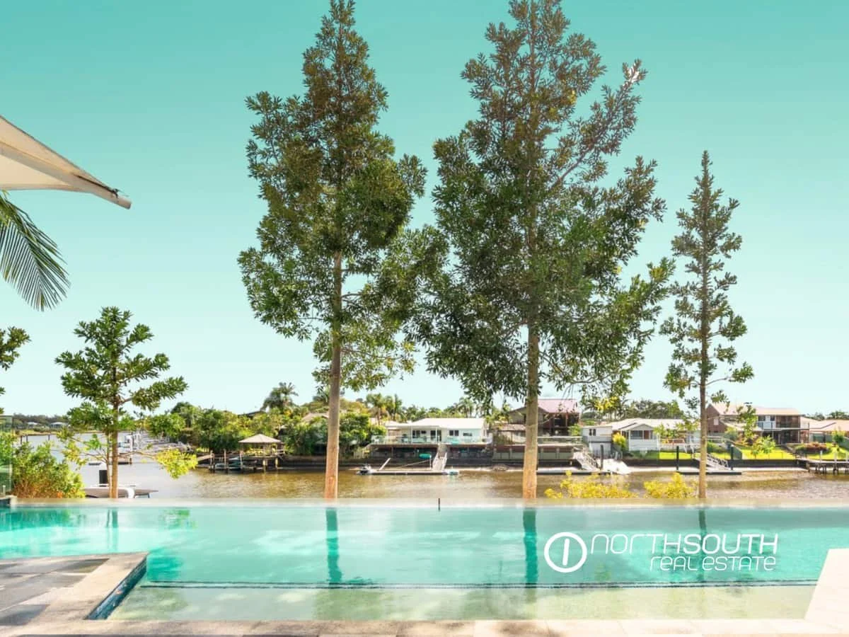 Infinity Pool overlooking canal from Waterpoint Residences, Biggera Waters QLD.