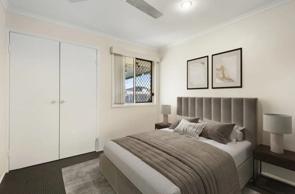 Comfortable bedroom with neutral finishes, and ceiling fan and natural light inside 13 Turquoise Crescent Griffin