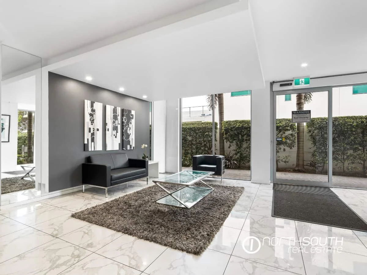 Foyer with a lounge area at 301 41 Harbour Town Drive Biggera Waters