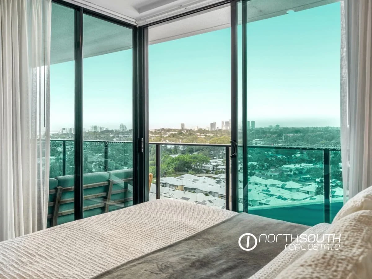 Gold Coast skyline and hinterland views from the master bedroom at 51109 Waterpoint Residences, Biggera Waters QLD.