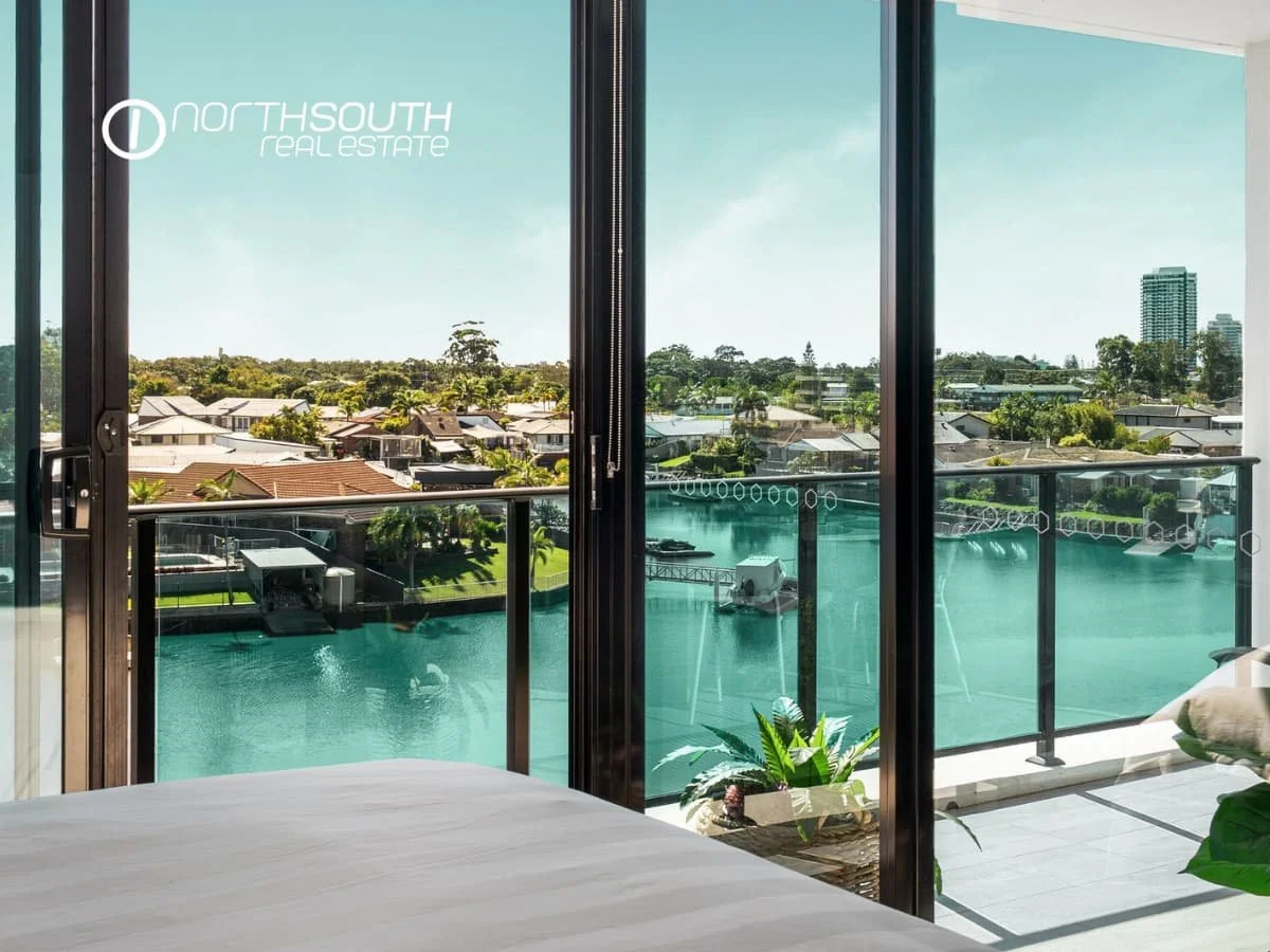 Water views from the master bedroom at Waterpoint Residences 3303/5 Harbourside Ct , Biggera Waters QLD.