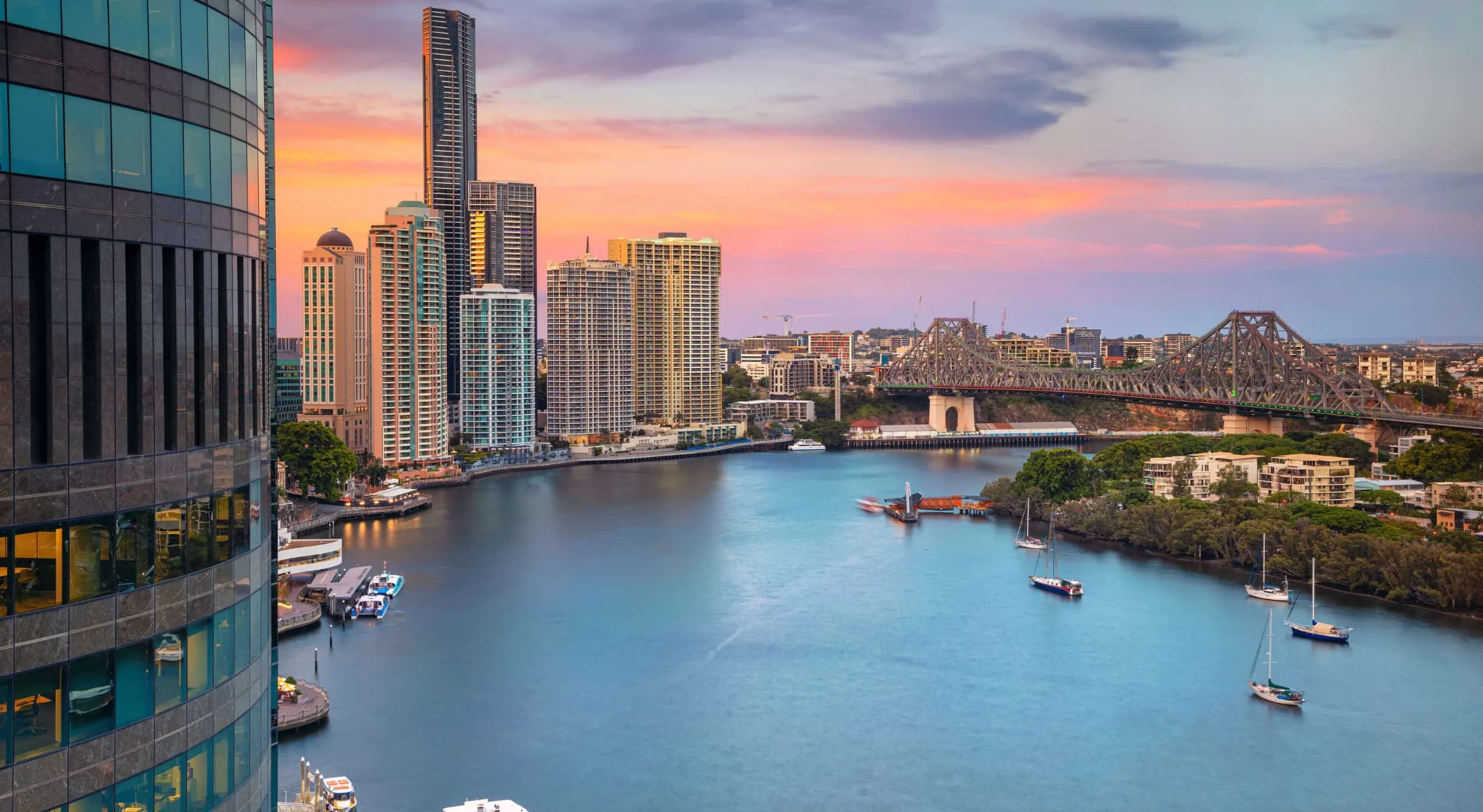 The Brisbane River at sunset, with the Story Bridge and the Brisbane City towers, QLD 4000