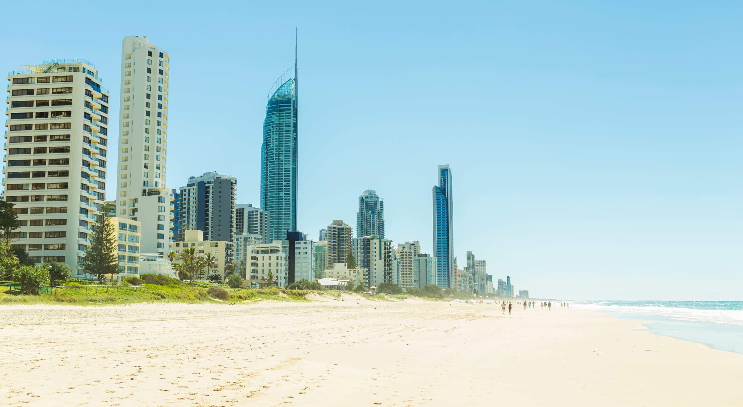 A view of luxury high-rise apartments along the coastline, representing prime Main Beach real estate on the Gold Coast.
