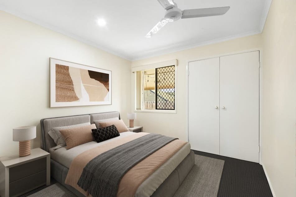 Secondary bedroom with ceiling fan, built in storage and neutral finishes in Griffin home purchased through professional buyer advocacy.