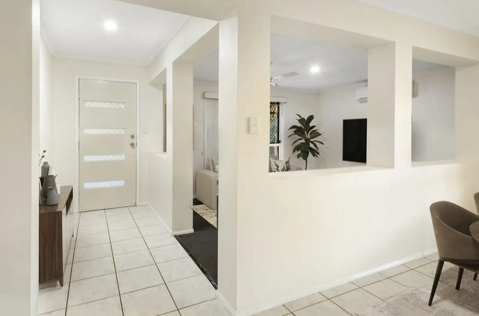 Internal hallway connecting living zones inside Griffin family home showcasing efficient layout