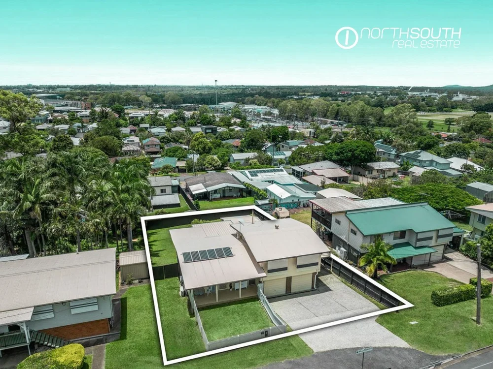 Aerial view of a residential property in Brisbane sold above market and purchased below market in the same week