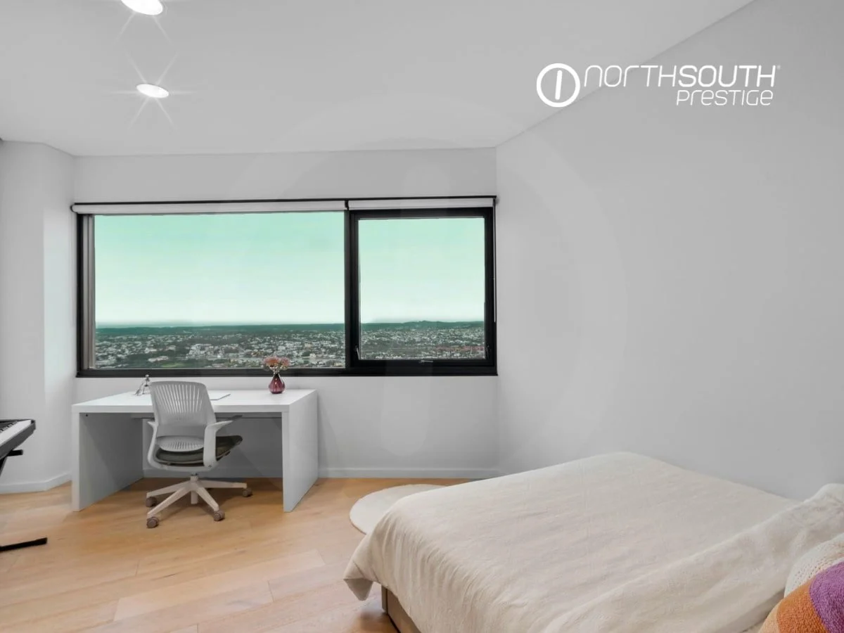 Third bedroom with an office and Brisbane views - properties for sale Riparian Plaza apartment 4903 