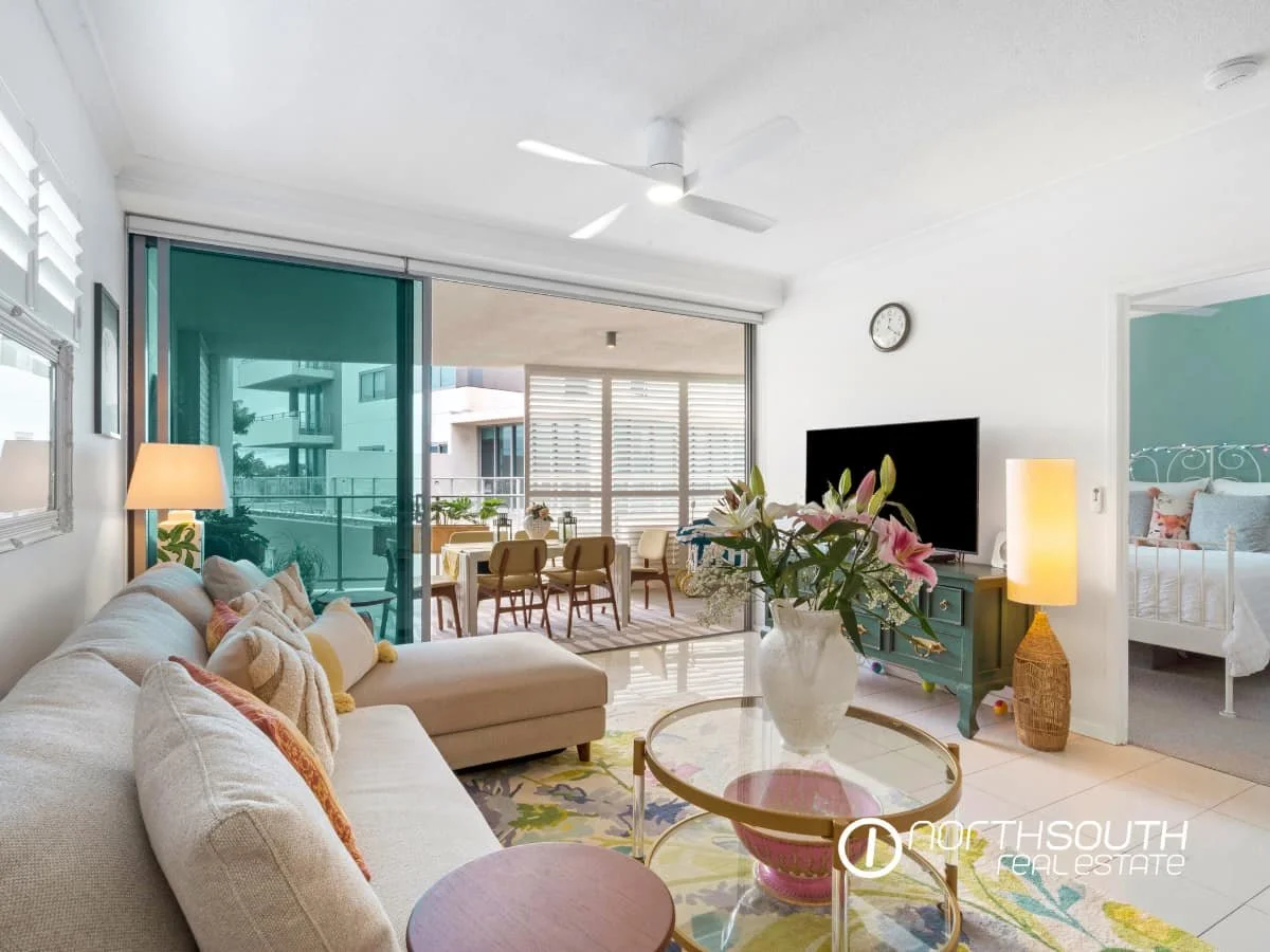 Living area with access to balcony and master bedroom at 301 41 Harbour Town Drive Biggera Waters