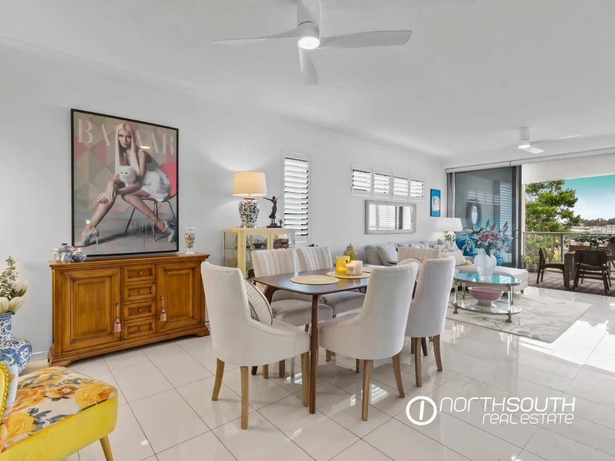 Open plan living area leading to large terrace at 301 41 Harbour Town Drive Biggera Waters