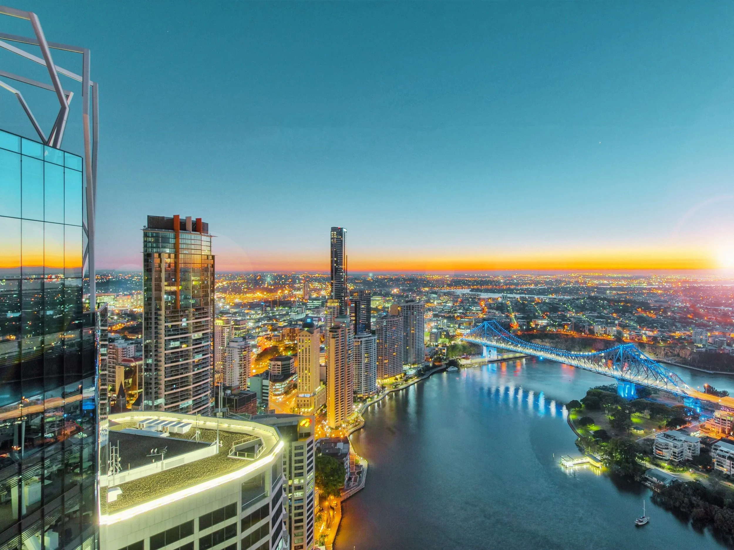Sunrise over the Story Bridge and the Brisbane River, seen from a riverside apartment