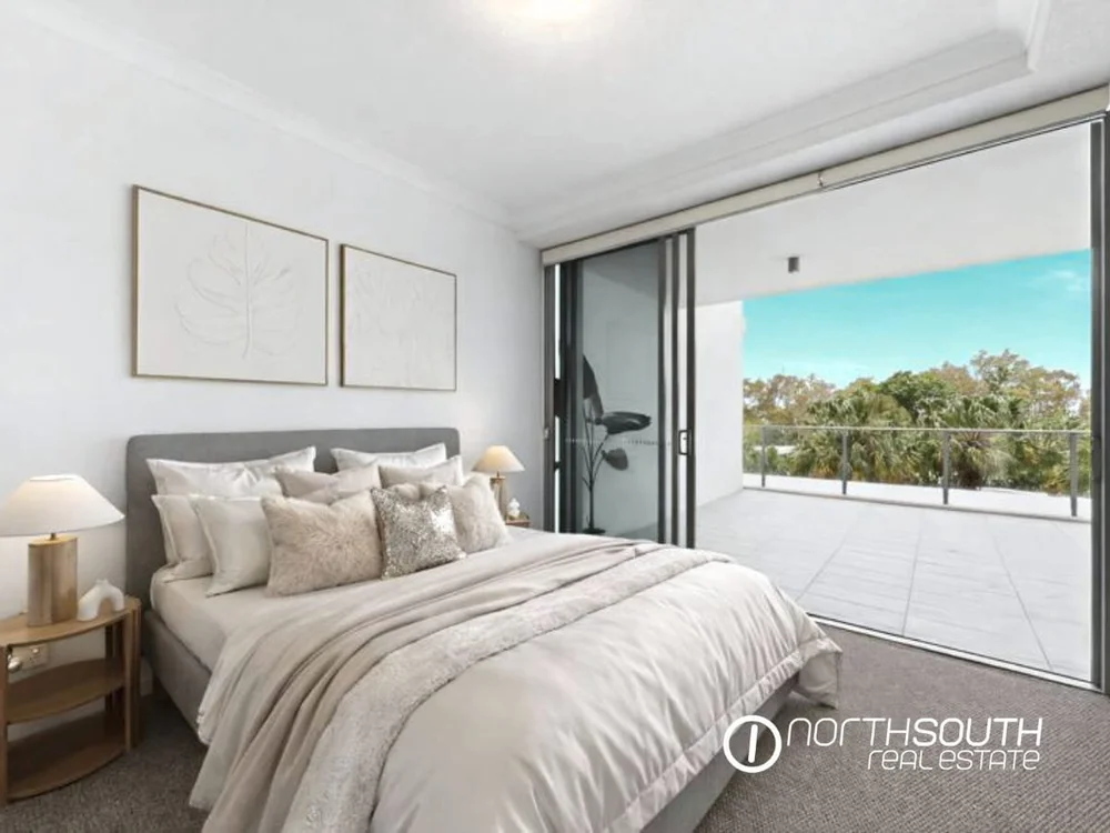 Master bedroom with a view to the terrace at 2202 25 East Quay Drive Biggera Waters