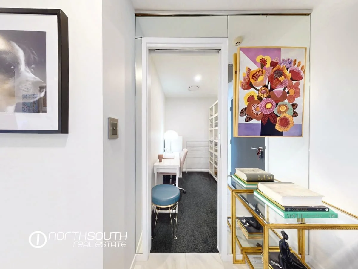 Study Room with Mirrored Wall at 4705 5 Harbourside Ct, Biggera Waters, QLD.