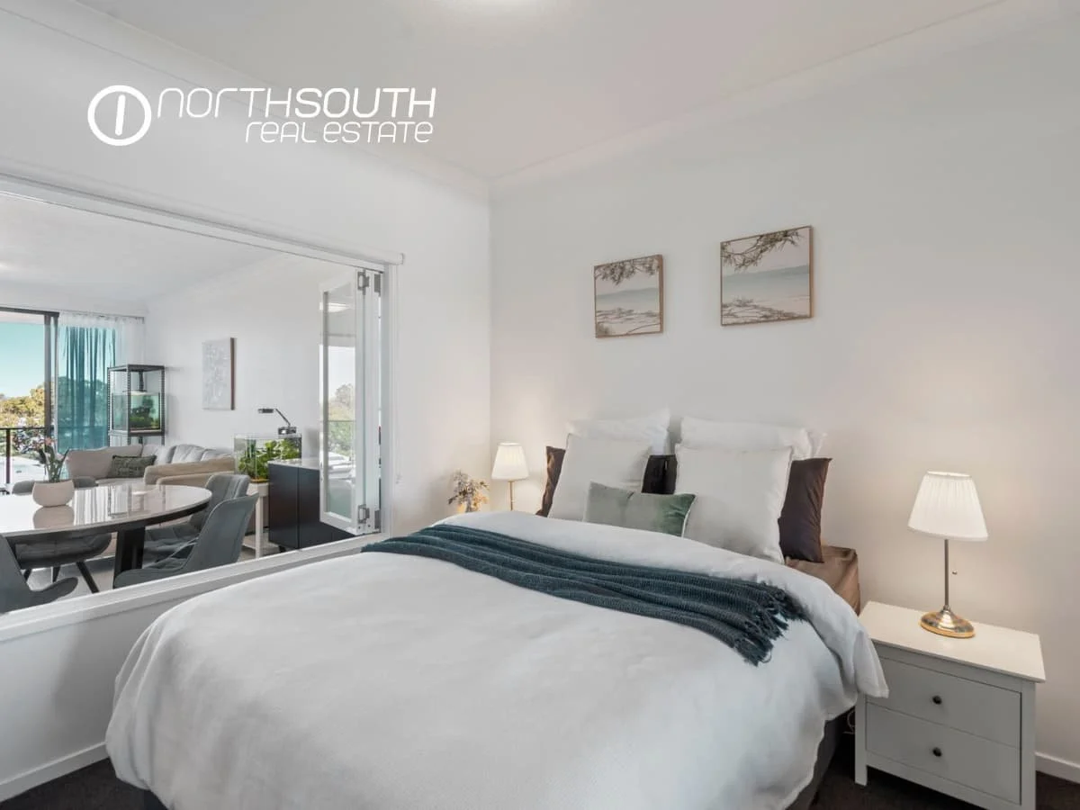 Second bedroom with window and natural light, in-built wardrobe at 3409/5 Harbourside Ct Waterpoint Residences, Biggera Waters QLD.