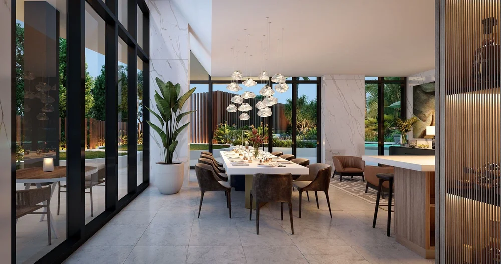 Gold Coast apartment for sale featuring elegant dining area opening to garden and pool amenities