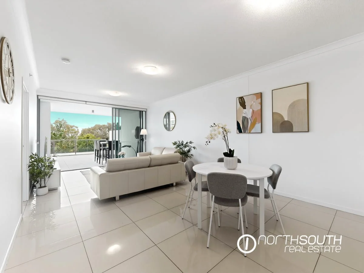 Open plan living area with terrace at 2202 25 East Quay Drive Biggera Waters