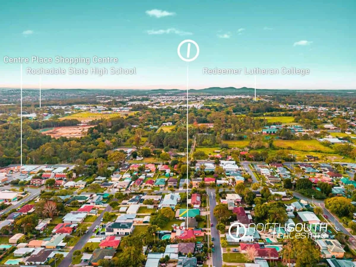 Drone view of the parks, mountains and the area surrounding the house at 7 Bligh Street, Rochedale South QLD 4123 indicating distance to various points of interest 