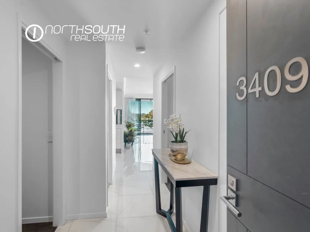 Entry view from the door through to the balcony of apartment 3409, Waterpoint Residences
