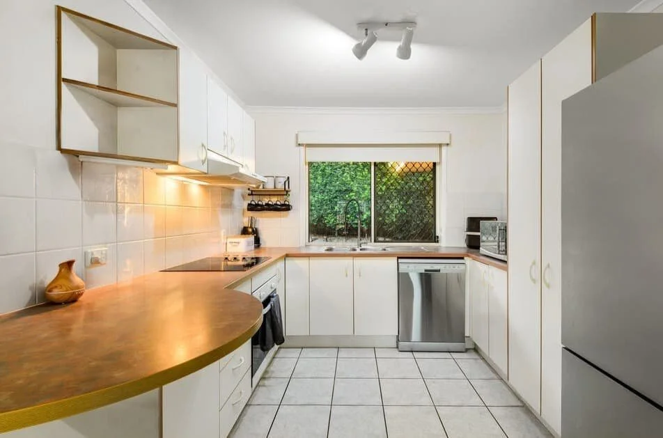 Kitchen with practical storage, stainless appliances and natural light at 13 Turquoise Crescent Griffin purchased through buyer advocacy.