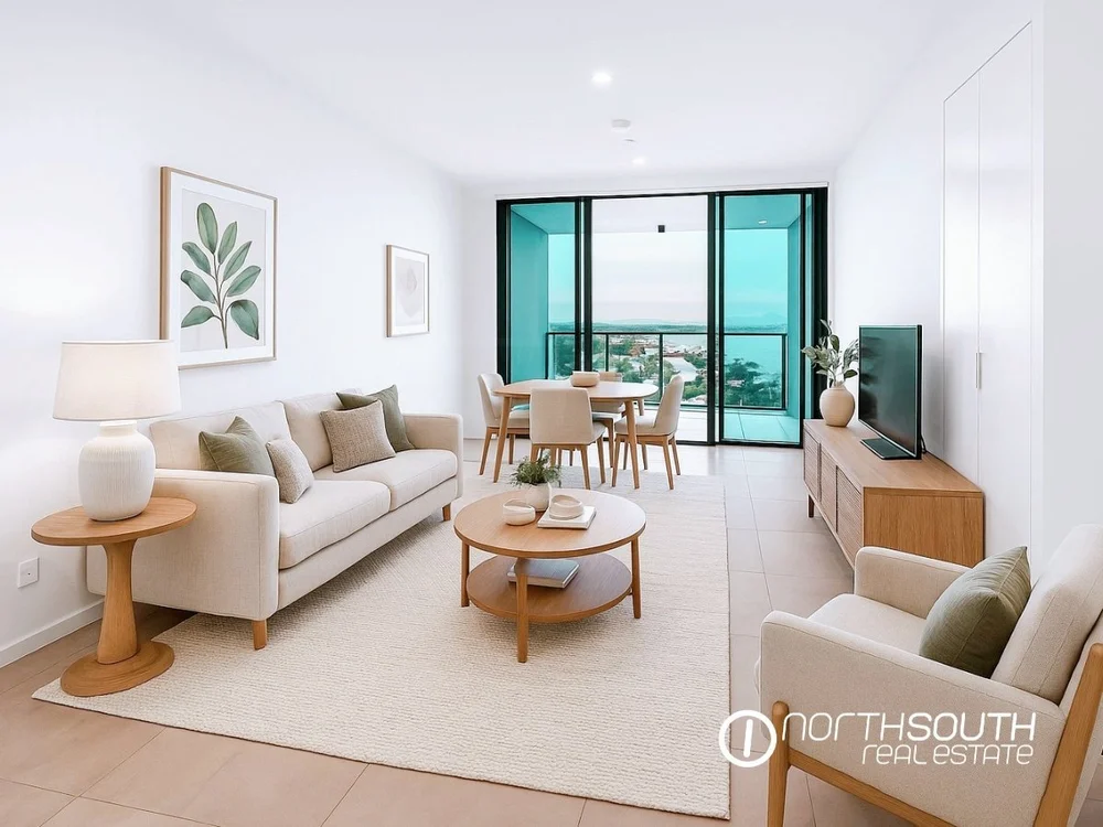 Spacious open plan living area in a WaterPoint apartment featuring modern Gold Coast properties for sale