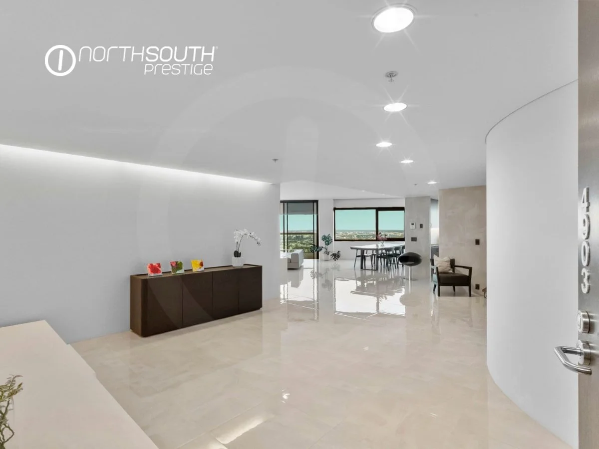 Expansive tiled entry flowing into living and dining area including kitchen - Brisbane properties for sale Riparian Plaza apartment 4903 