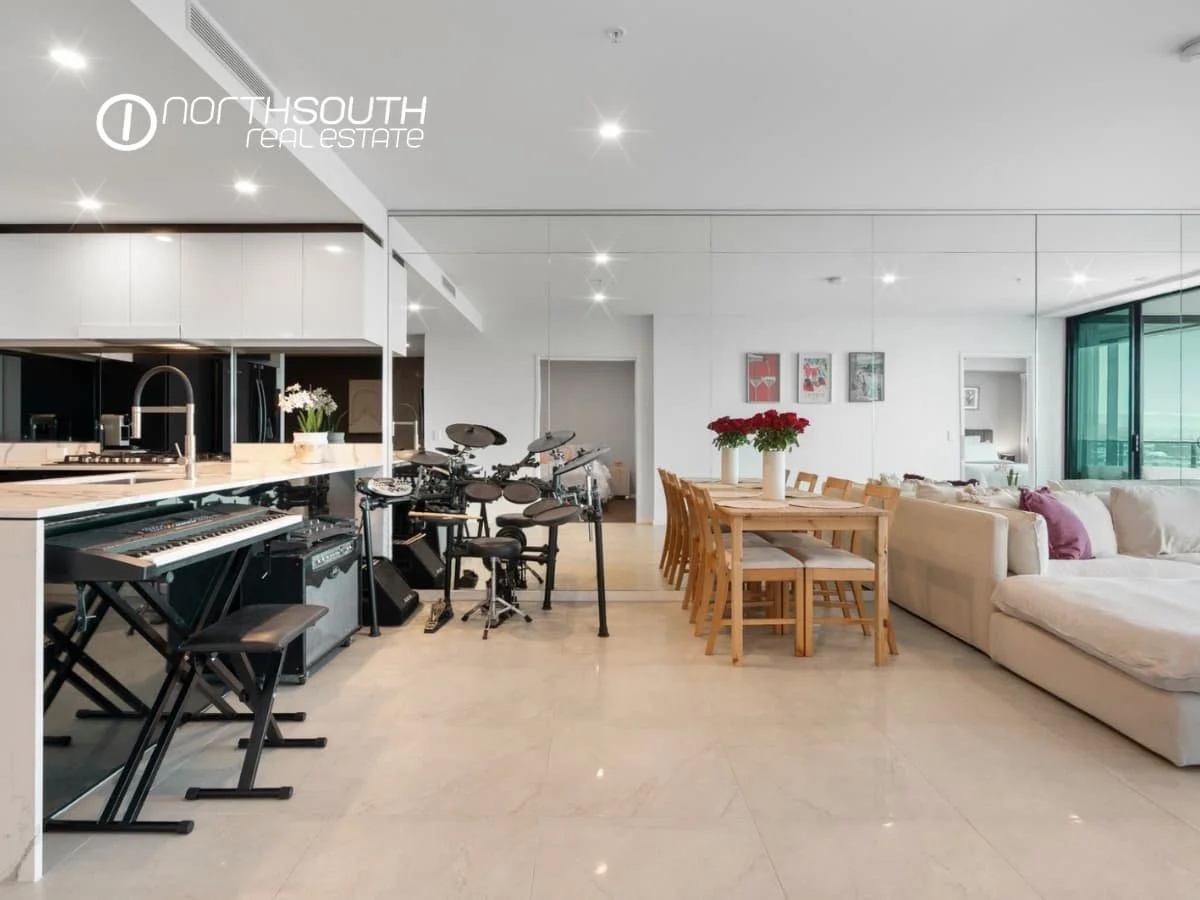 Spacious living and dining zone with tiled floors at 51109 5 Harbourside Ct Waterpoint Residences, Biggera Waters QLD. 