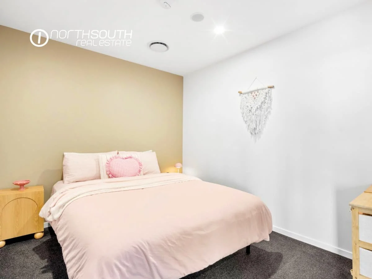Second bedroom with in-build wardrobe at 51109 Waterpoint Residences, Biggera Waters QLD.