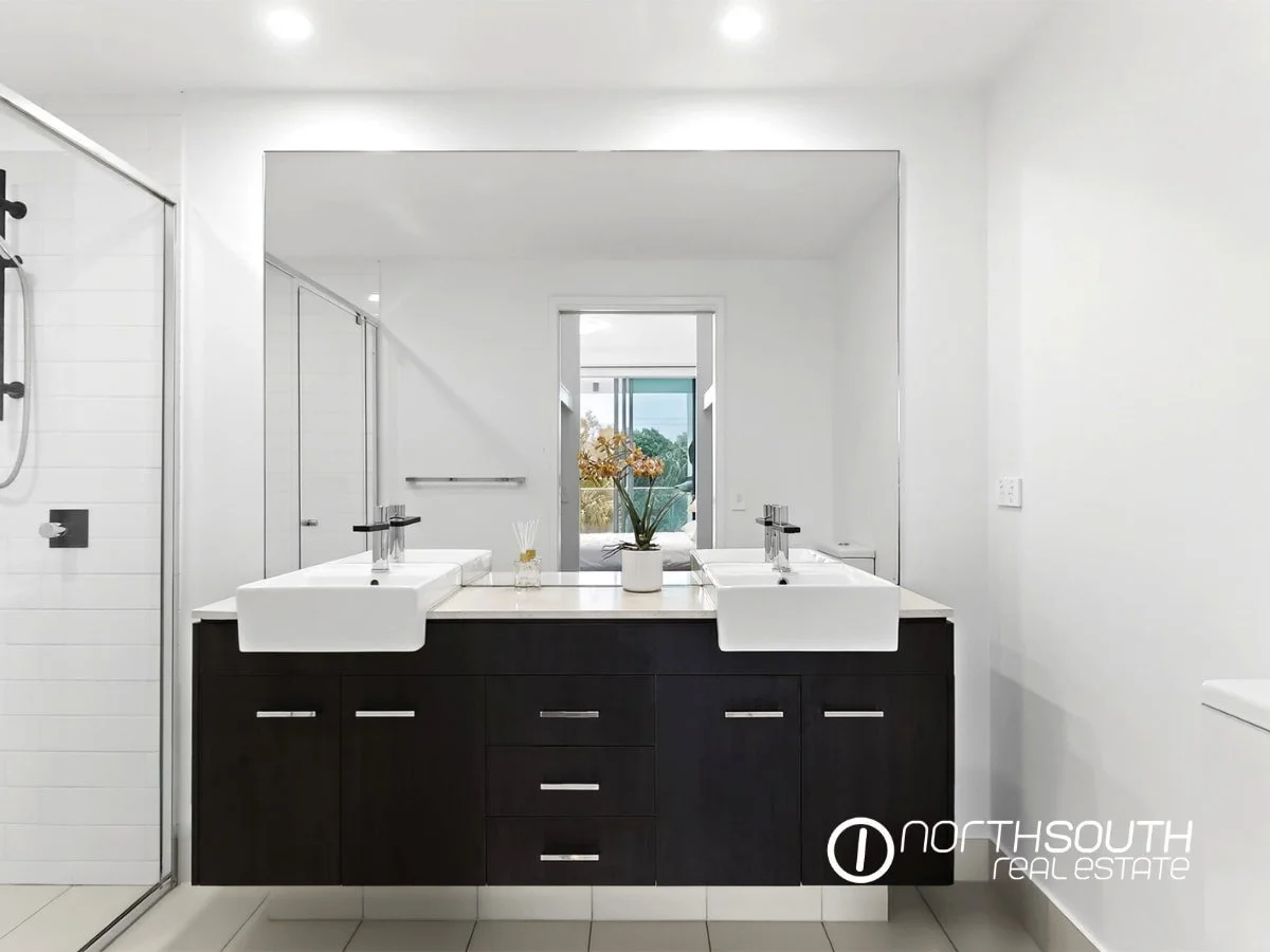 Master ensuite with double sink and shower at 2202 25 East Quay Drive Biggera Waters