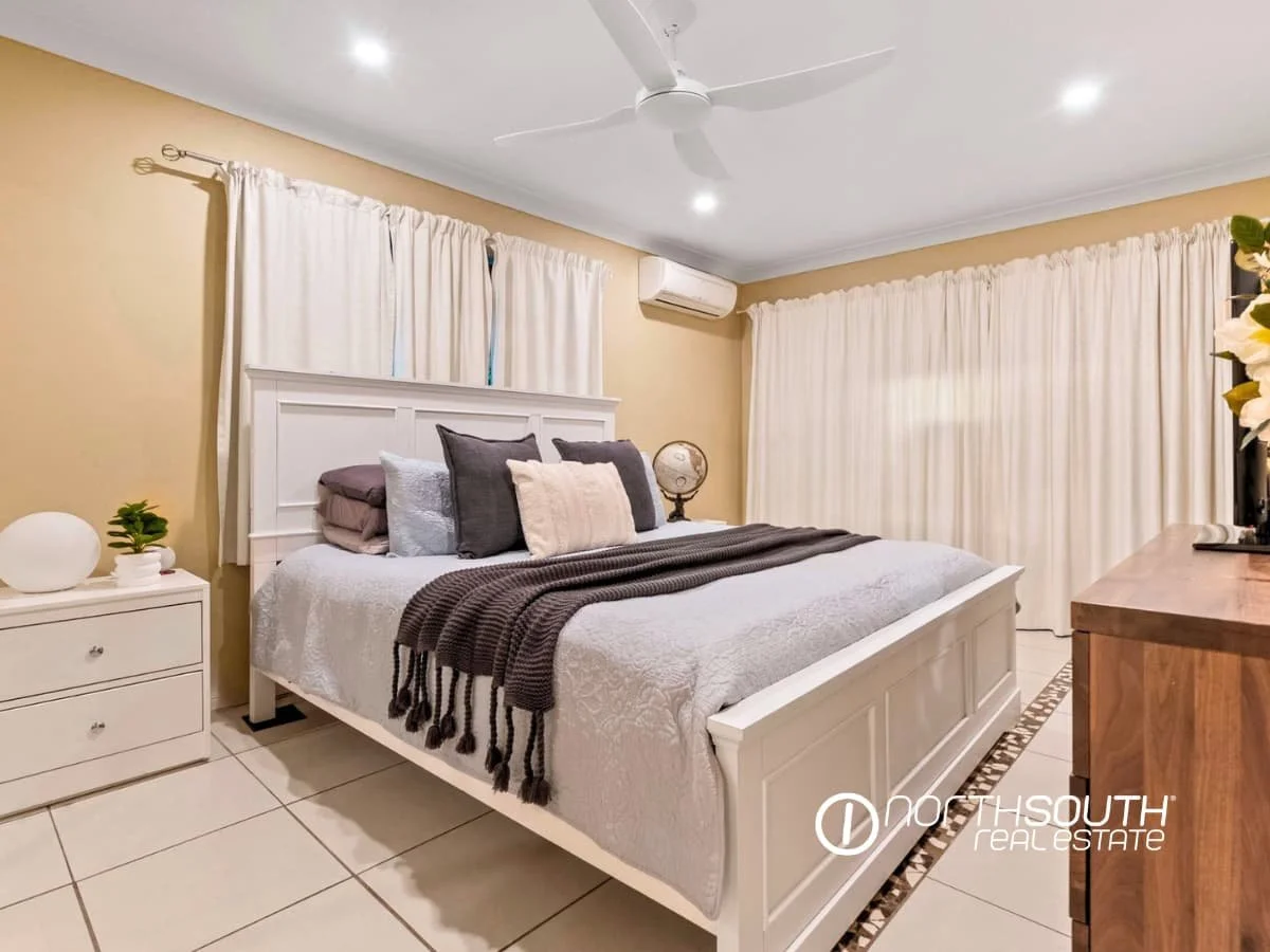Second bedroom with a ceiling fan, white curtains, bed, bedside table and tiled floors at 7 Bligh Street, Rochedale South QLD 4123