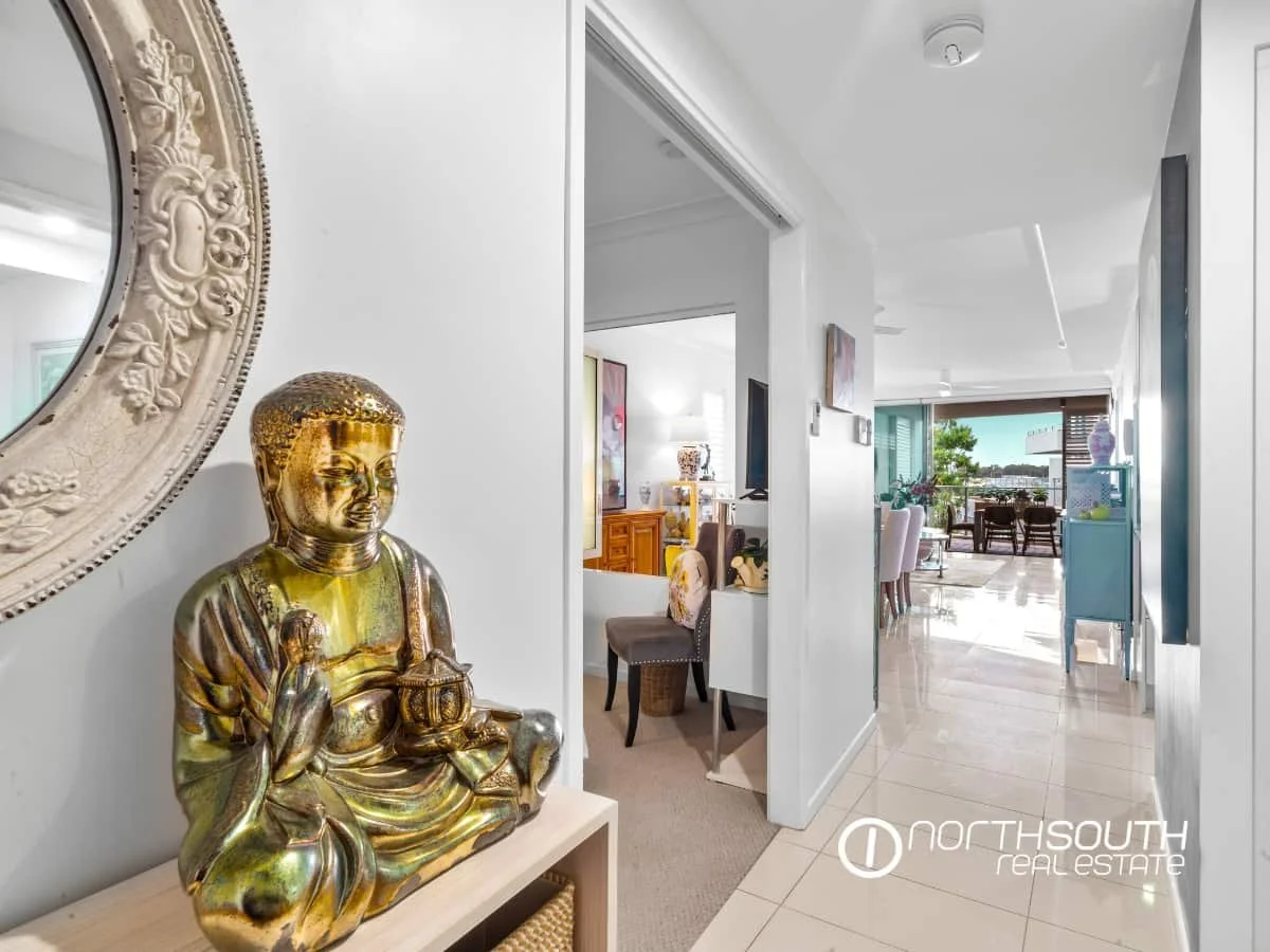 Entry leading to guest bedroom and living area at 301 41 Harbour Town Drive Biggera Waters