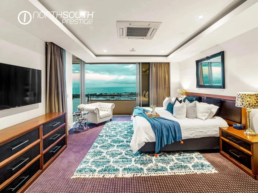 Image of properties for sale gold coast southport apartment penthouse master bedroom with coastal outlook.