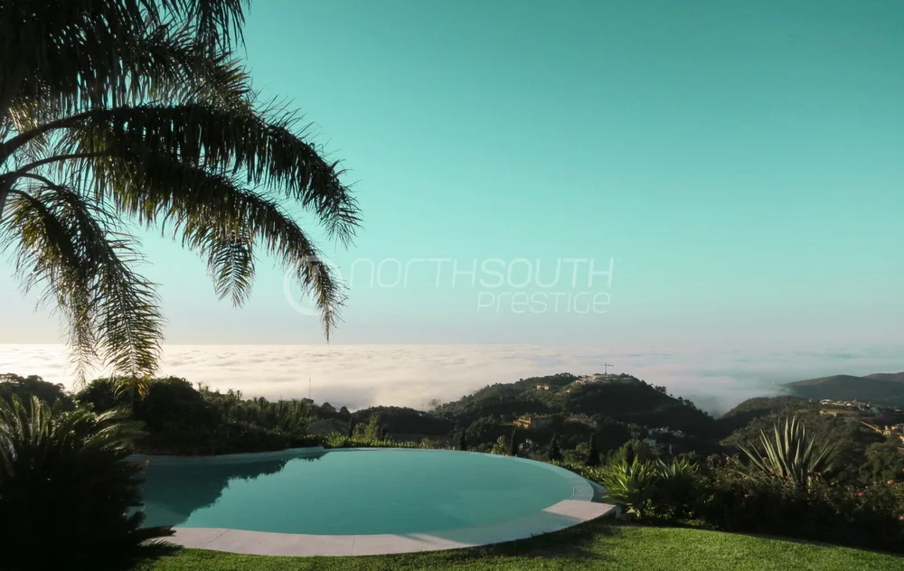 Morning cloud sitting below the infinity pool at the villa.