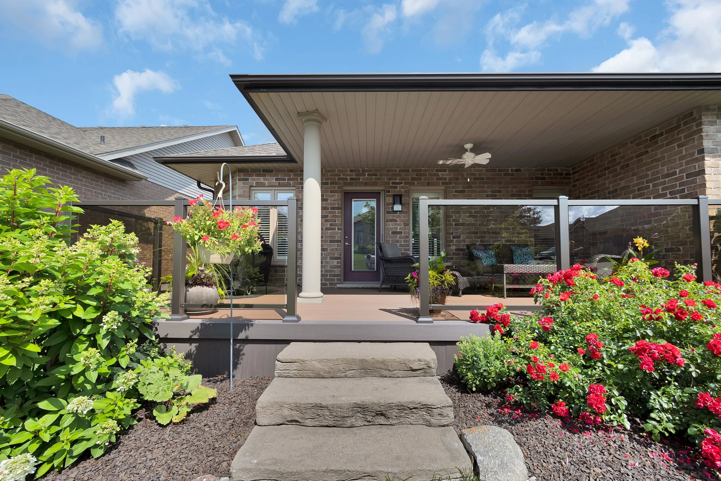 Maintenance Free AZEK Vintage PVC Deck with TimberTech Glass Railings - Located in Stonecroft New Hamburg