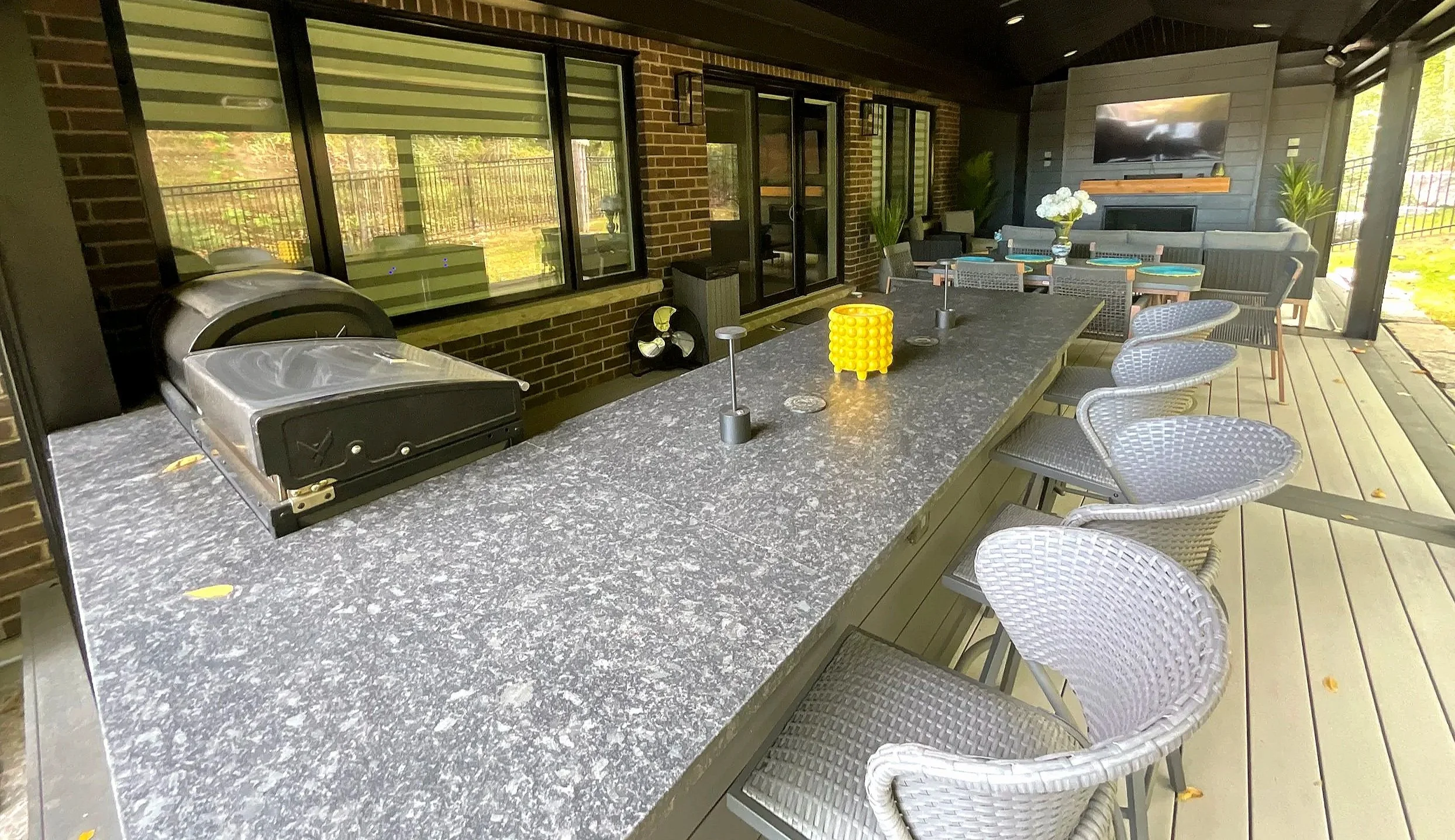 Outdoor kitchen in Kitchener Ontario. Includes granite countertop and gas BBQ, Griddle