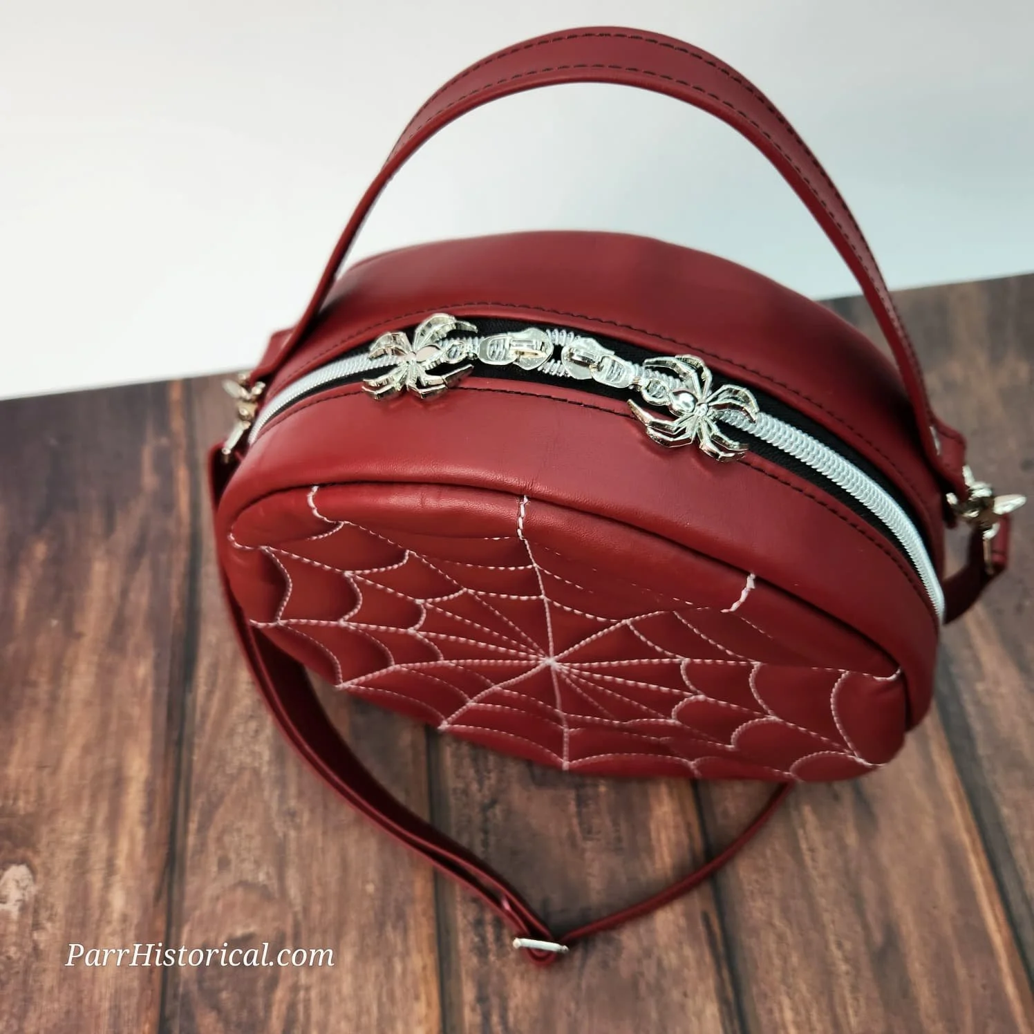 Red Spider Bag Zipper Pulls.jpeg