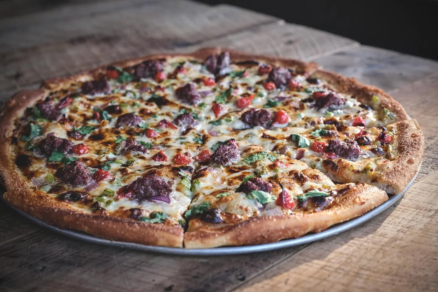 Our seasonal menus are always a great opportunity for us to come up with some new ideas, mess around in the kitchen a bit, see what happens. Cook it. Shoot it. Print it.

Our Winter Menu is hitting tables now. Featuring the Southwest Queso Pizza - a 