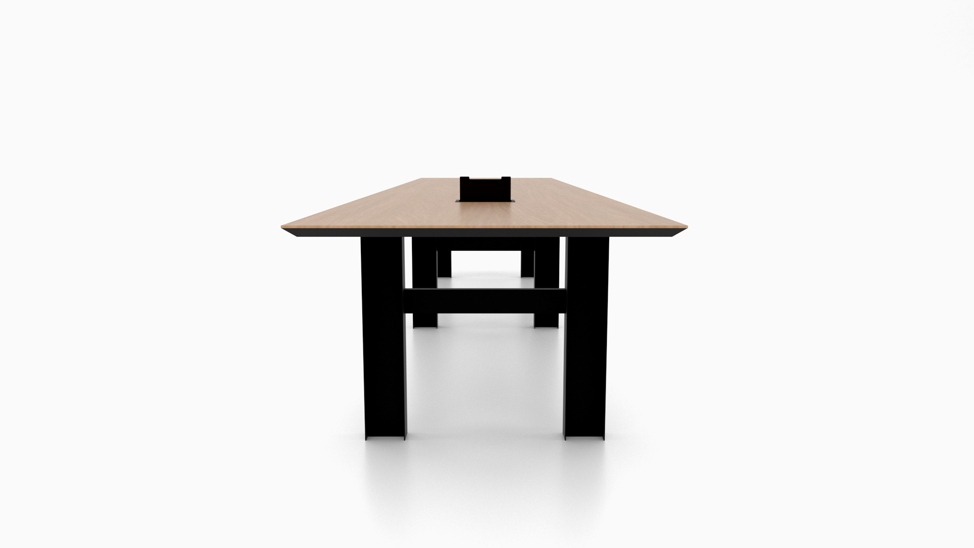The Rockefeller conference table by Cornerstone Furniture combines a bold design with a steel I-beam base, delivering industrial strength and modern style.