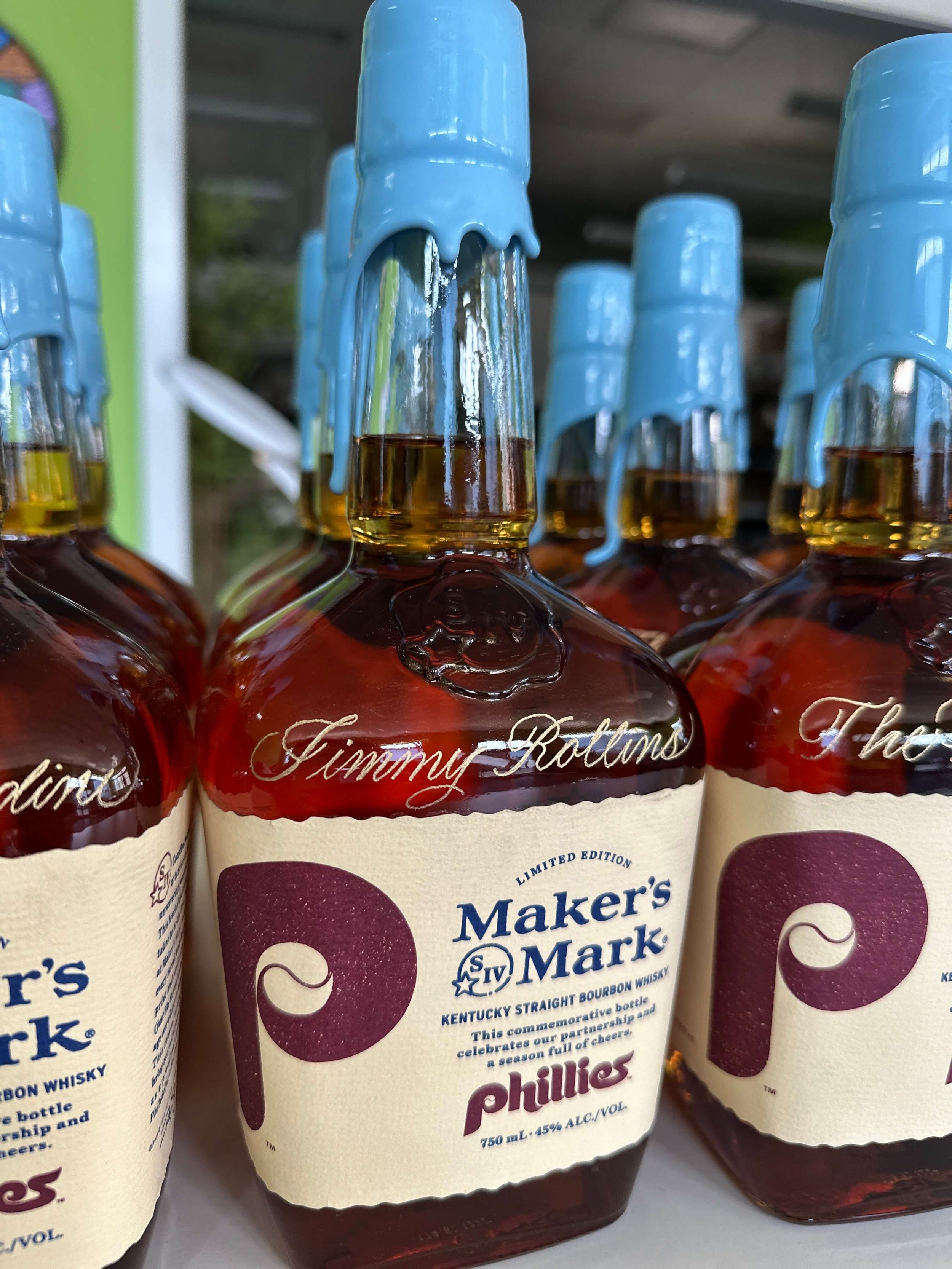 Special edition powder blue wax dipped maker's mark bottles with the Phillies logo and Jimmy Rollin's name engraved in gold