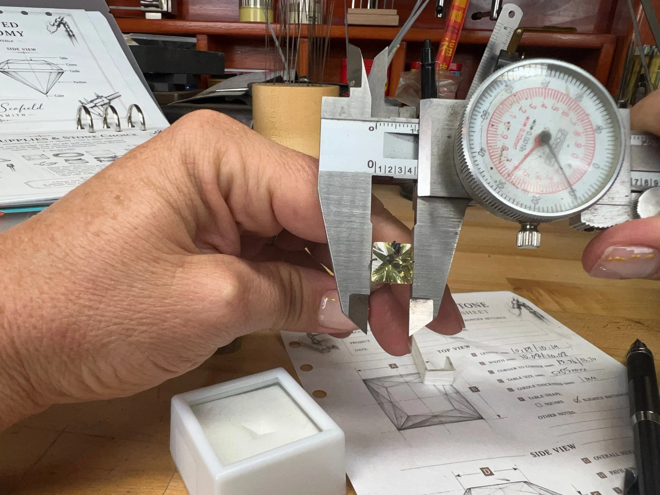 Dial Calipers and Square Faceted Stone