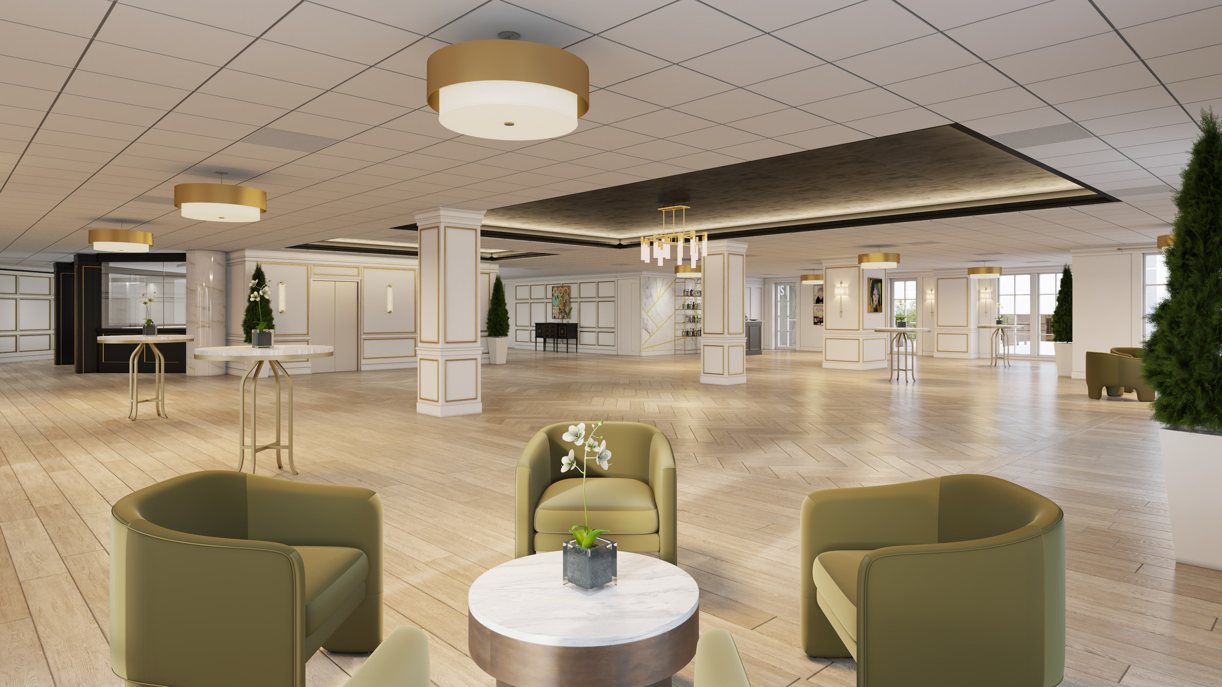 Spacious, elegant lounge area with green armchairs around a small round marble table with a white orchid in a gray pot, and more seating and tables in the background with large windows letting in natural light.