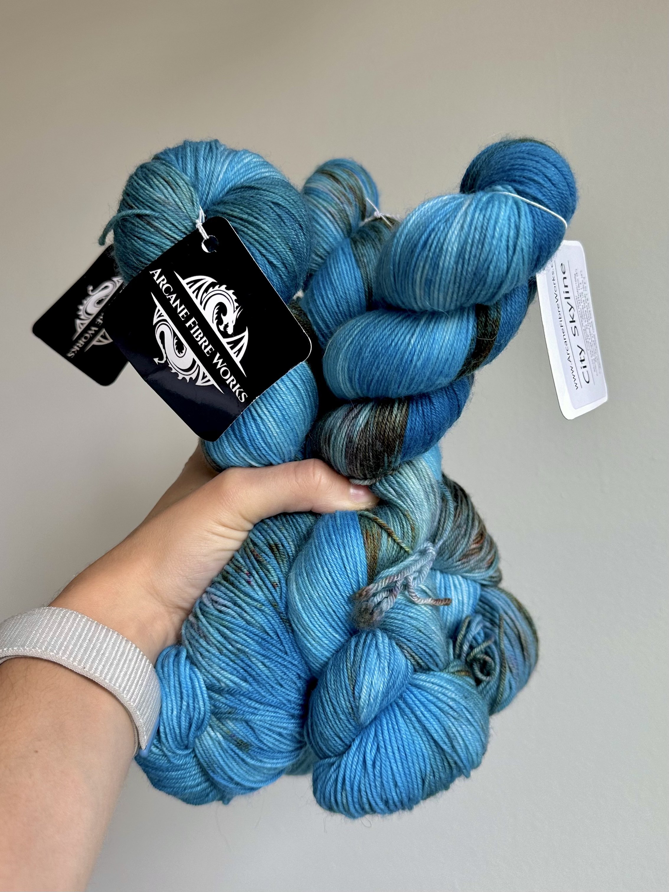 City Skyline skeins of yarn from Arcane Fiber Works