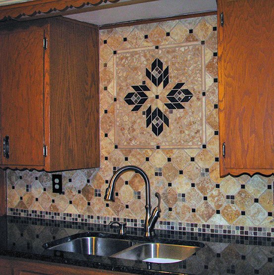 Custom kitchen backsplash floral design with black and tan tiles