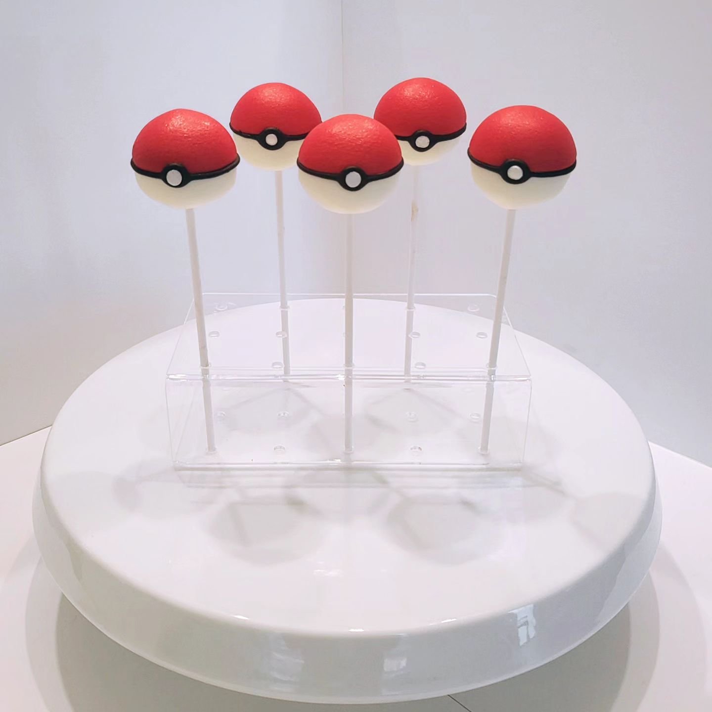 Who will they be? &gt;Boy &gt;Girl ❓🎮⚡ super cute pokeball cake pops and mini cake for a gender reveal 🥹 I love this idea