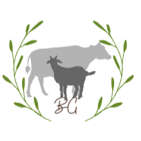 Silhouette of a cow and a calf inside a laurel wreath