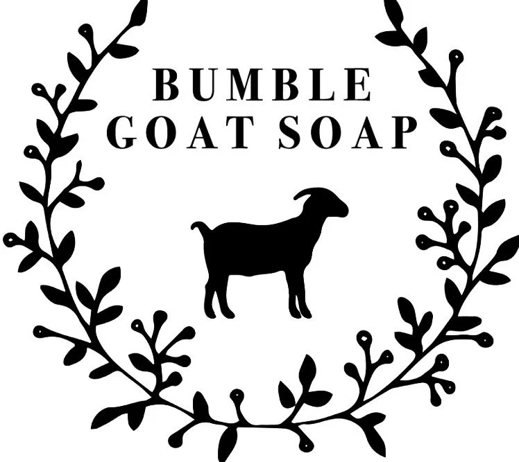 Black and white label for Bumble Goat Soap with a goat silhouette inside a wreath of leaves.
